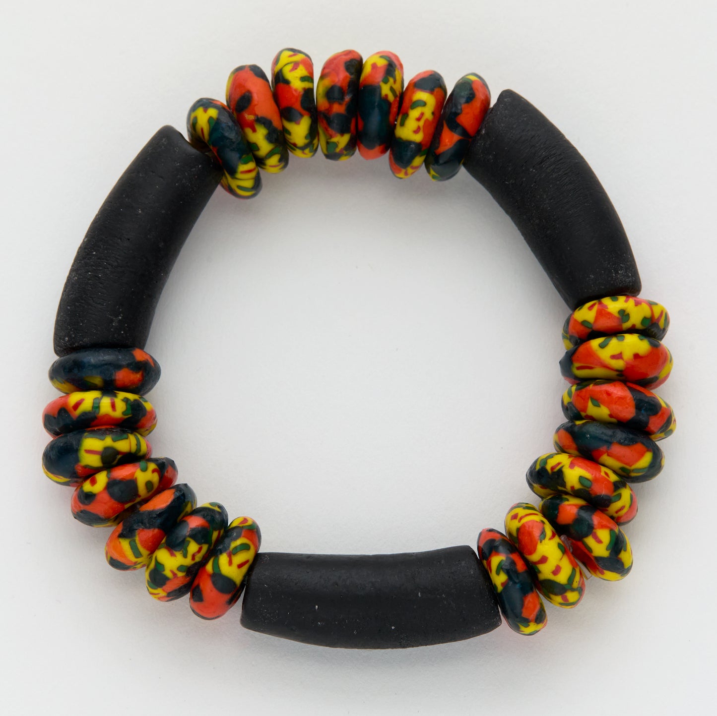 Bracelet with black and multicolored beads on a white background