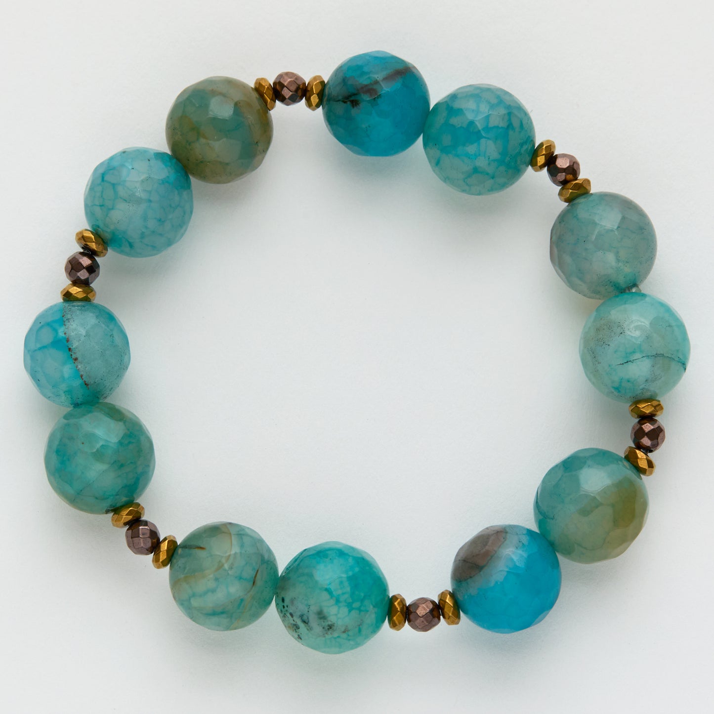 Beaded bracelet with turquoise and green beads on a white background