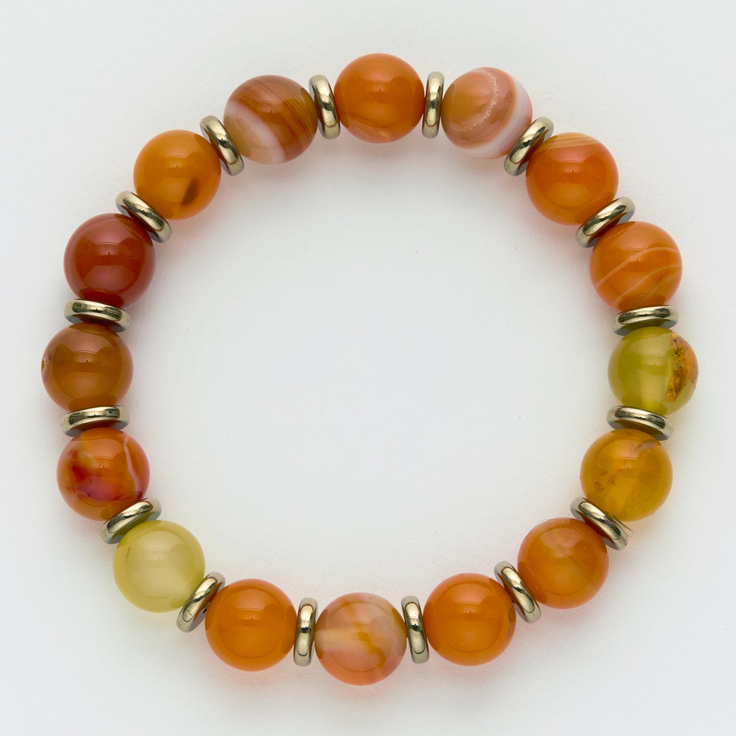 Beaded bracelet with orange, yellow, and red beads on a white background