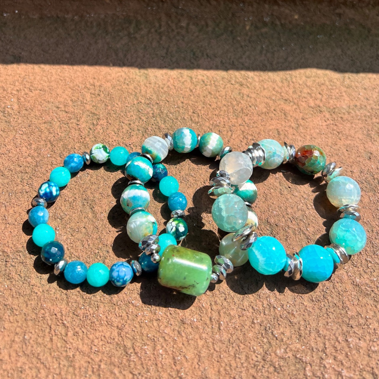 3 piece bracelet stack in tones of blue and green