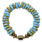 Bracelet with blue beads and gold accents on a white background