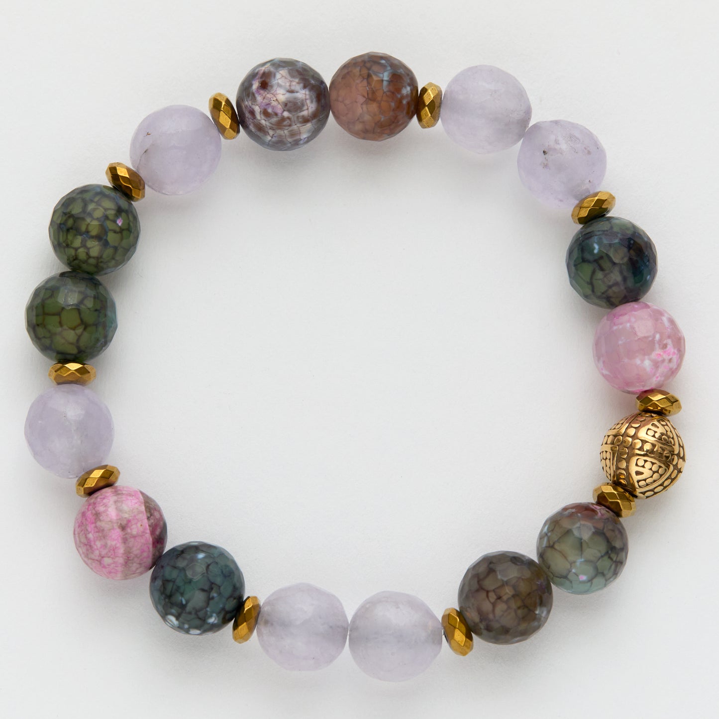 Multicolored beaded bracelet with gold accents on a white background