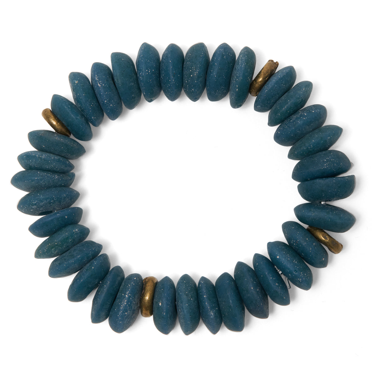 A beaded stretch bracelet made of dark teal-blue Ashanti beads with brass spacer beads, shown on a plain white background.