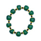 Hunter green bracelet with brass and black accent beads against white background