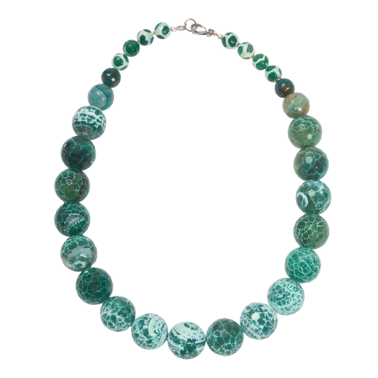 Necklace with green marbled beads on a white background