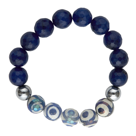 Navy blue beaded bracelet with silver and patterned beads on a white background