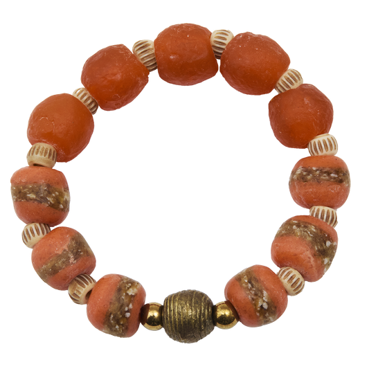 Bracelet with orange beads and gold accents on a white background