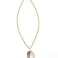 Necklace with a large, oco agate pendant on a thin gold chain against a white background.