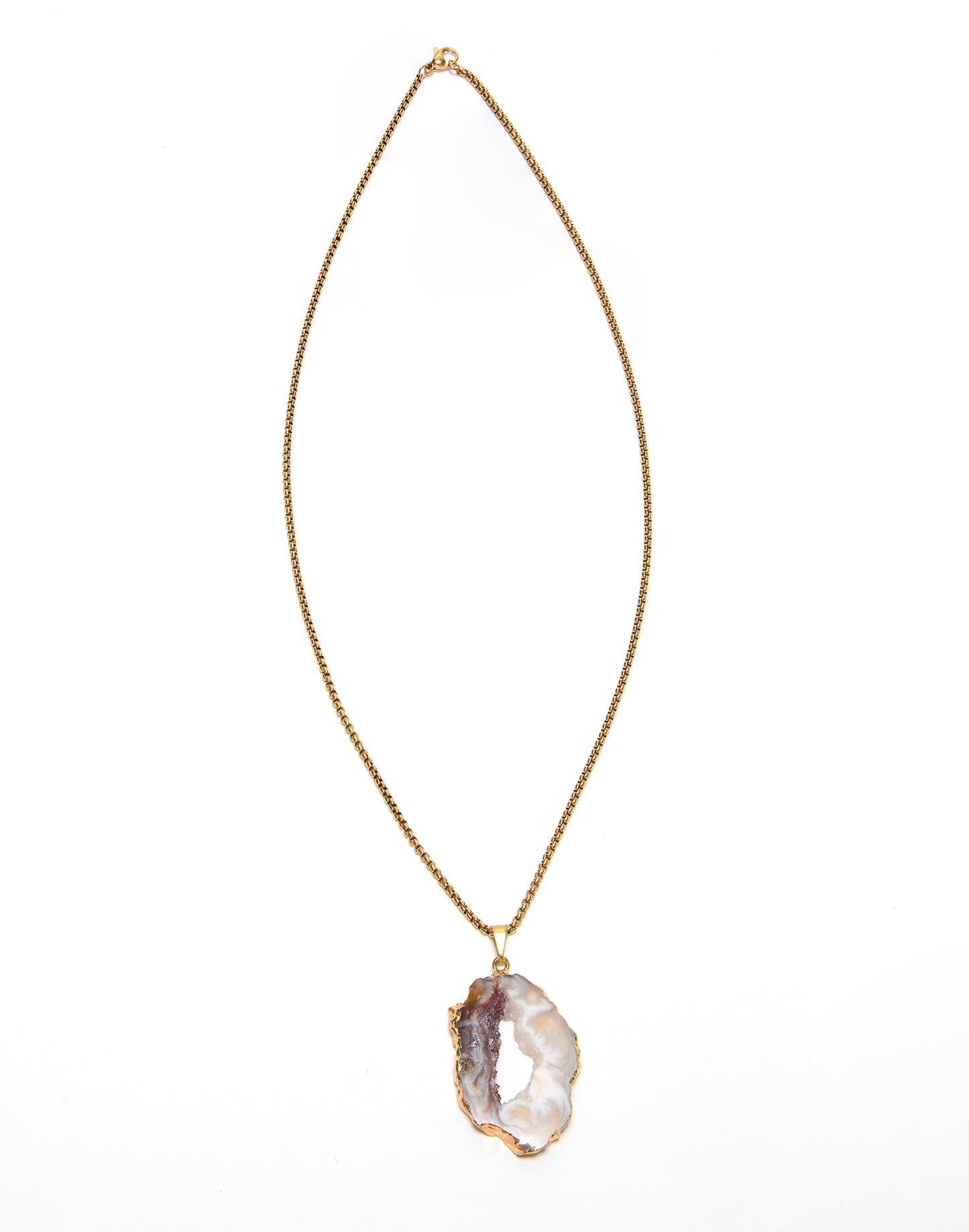 Necklace with a large, oco agate pendant on a thin gold chain against a white background.