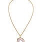 Gold necklace with a large oco agate pendant on a white background