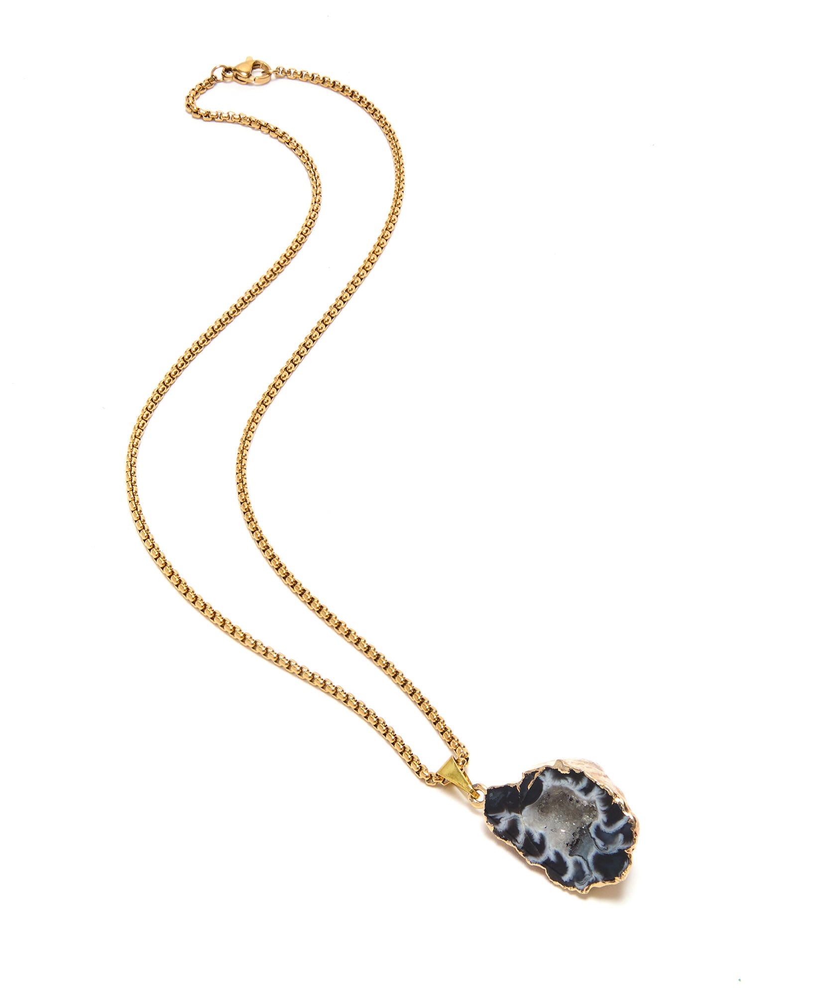 Gold necklace with a pendant on a white background