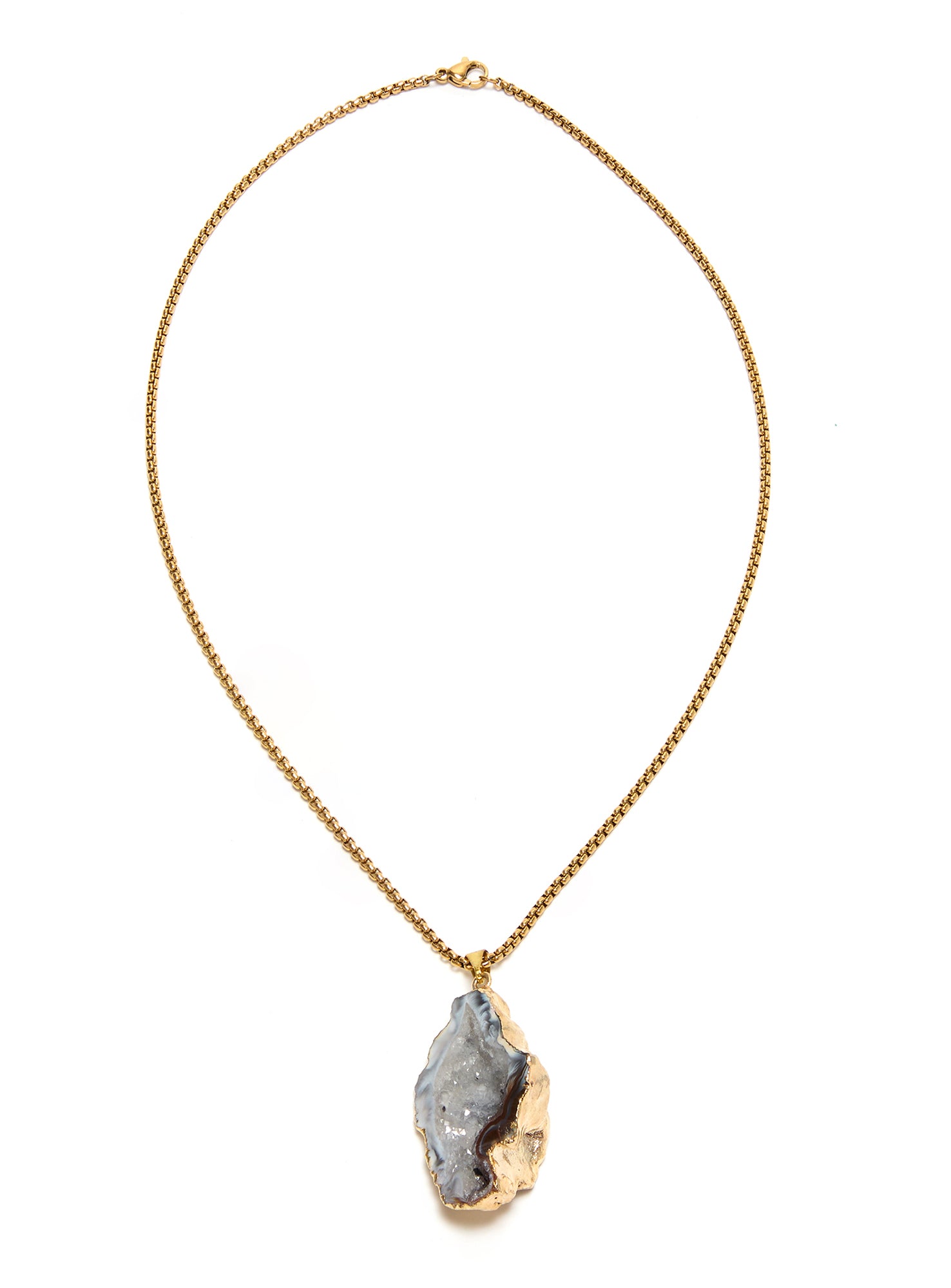Necklace with a gray stone pendant on a gold chain against a white background