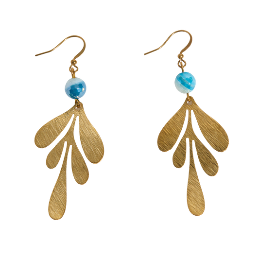 Brass leaf-shaped earrings with blue beads on a white background