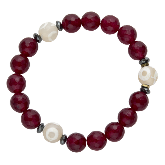 Beaded bracelet with red, white, and black beads on a white background