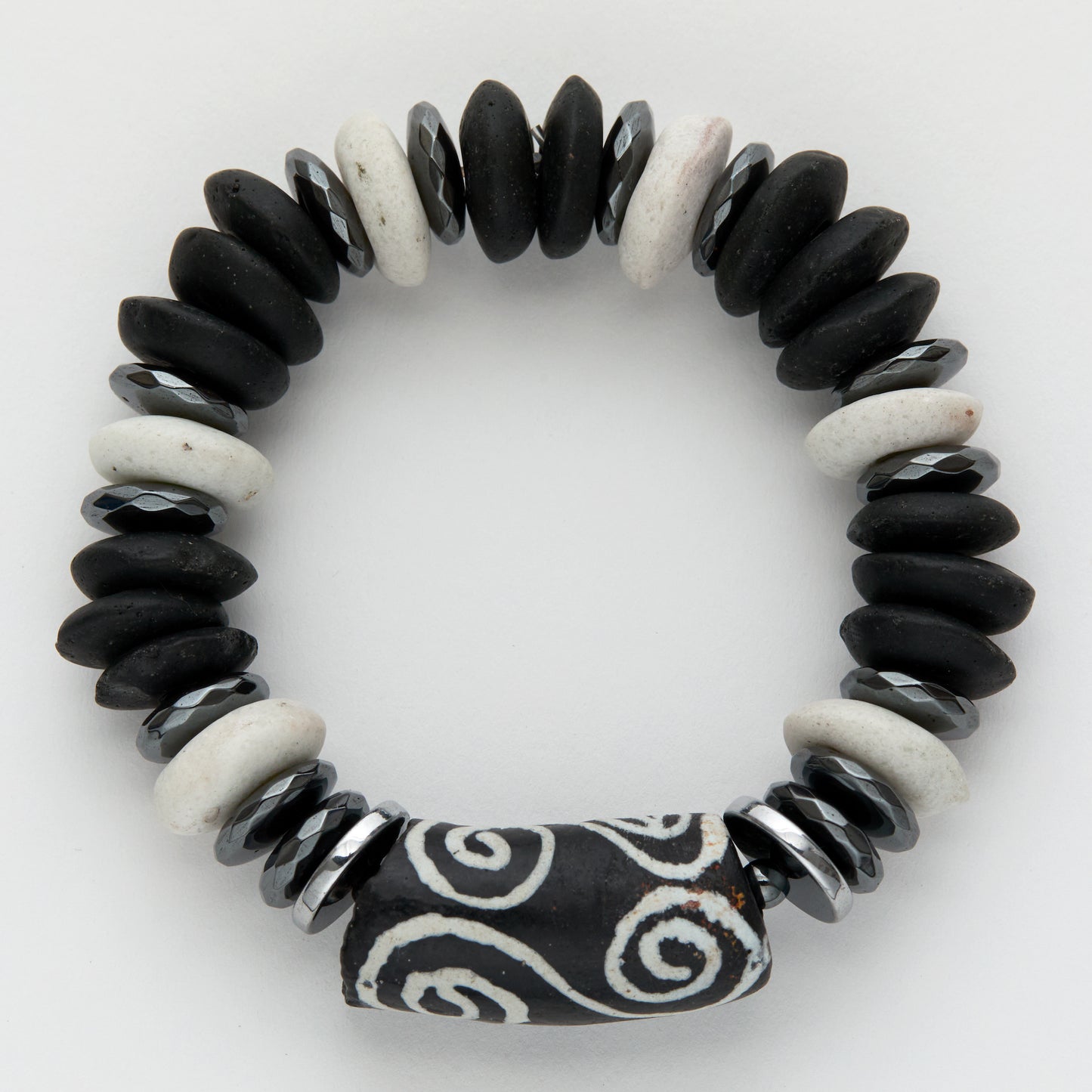 Black and white beaded bracelet on a white background