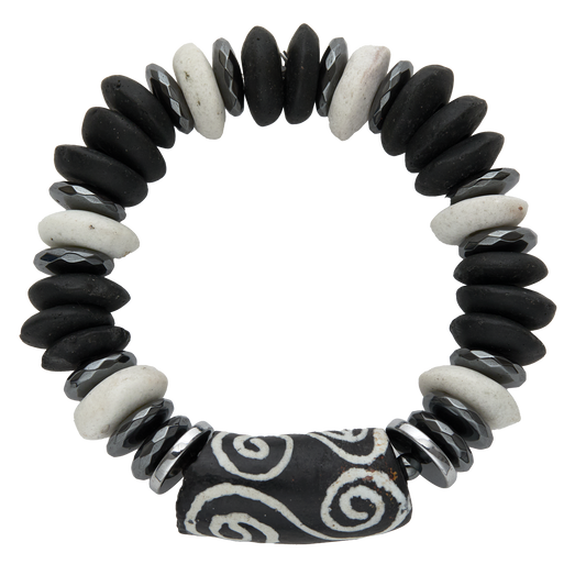 Bracelet made of black, white, and silver beads on a white background