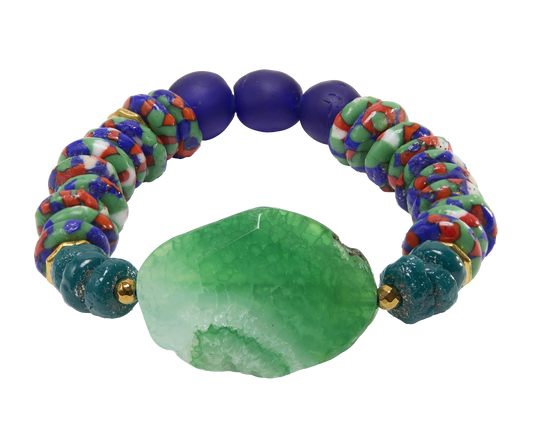 Colorful beaded bracelet with a large green stone on a white background