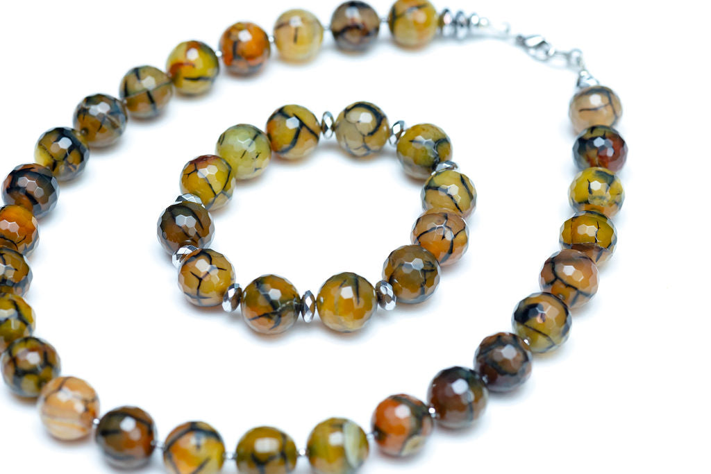 Closeup of Morgan bracelet and matching Morgan necklace against a white background. 