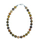 A beaded necklace with a stainless steel lobster clasp, featuring a variety of colored beads against a white background.