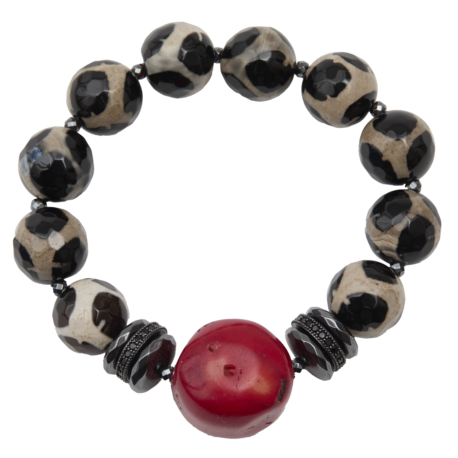 Bracelet with black and white patterned beads and a red central bead on a white background