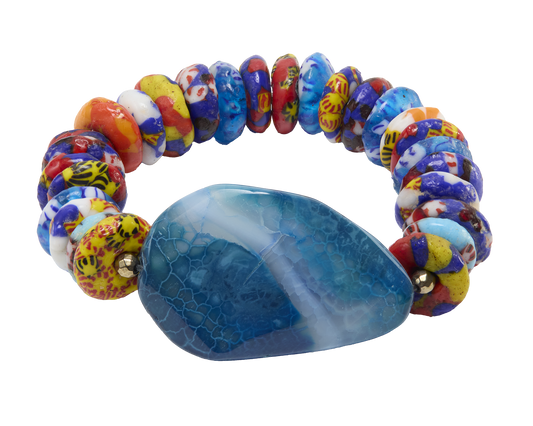 Colorful beaded bracelet with a large blue stone on a white background