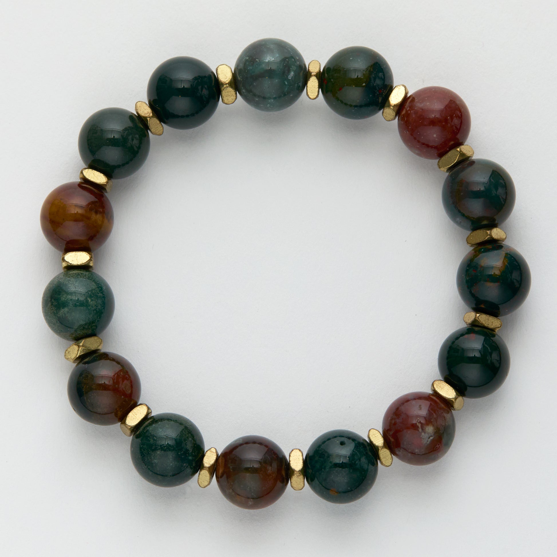 Beaded bracelet with green and brown stones on a white background