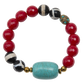 Multicolored beaded bracelet with red, black, white, turquoise, and gold beads on a white background