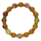 Beaded bracelet with orange, yellow, and red beads on a white background