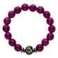 Purple beaded bracelet with a decorative black and silver bead on a white background