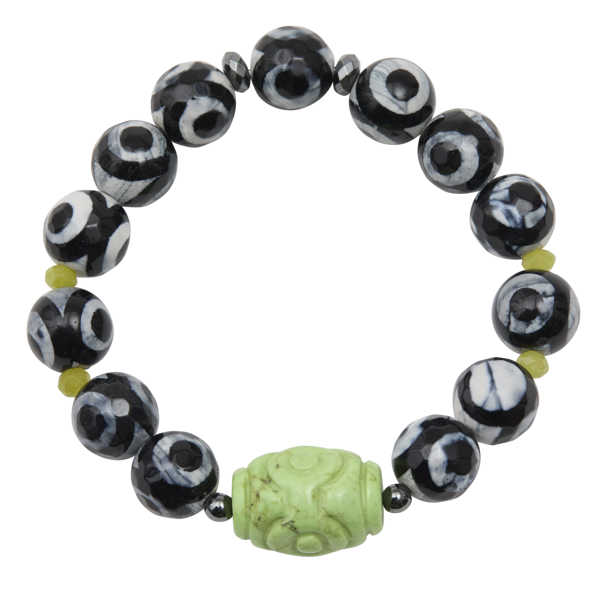 Black and white beaded bracelet with a green carved bead on a white background