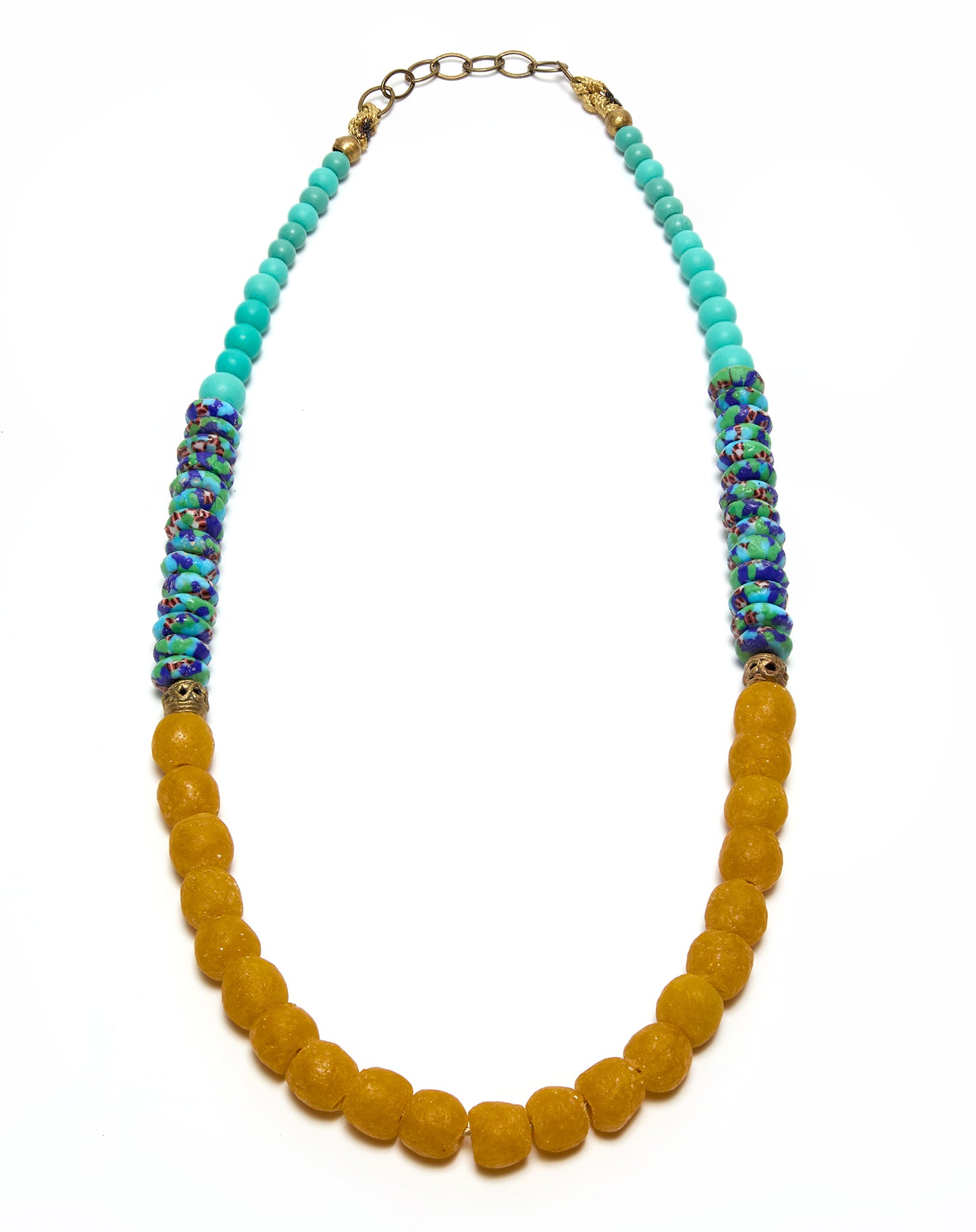 Necklace with yellow beads and multicolored accents on a white background